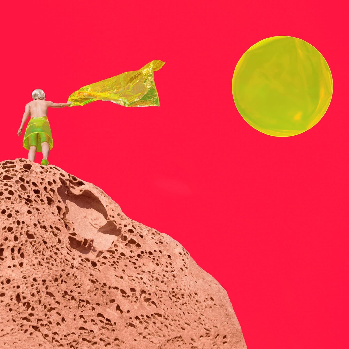 THE MOON — a figure on a porous red rock reaches toward a glowing green orb against a hot-pink sky.