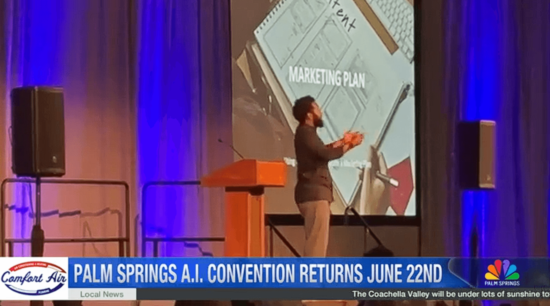 NBC Palm Springs broadcast still — chyron reads 'PALM SPRINGS A.I. CONVENTION RETURNS JUNE 22ND' over a stage shot of a speaker with a Marketing Plan slide.